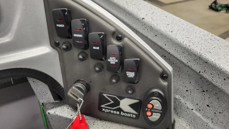 Slide: The Image of Control panel of 2023 Xpress H18C Crappie boat with Yamaha Vmax 115 SHO. - 18