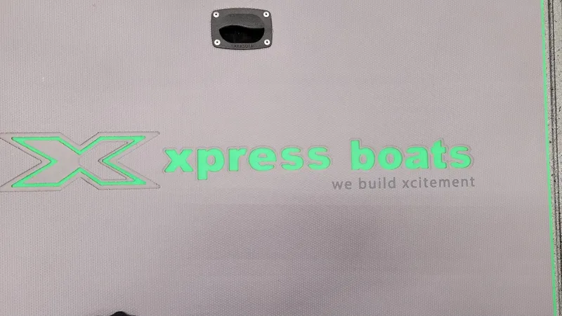 Slide: The Image of Xpress Boats logo with slogan 'we build xcitement' on 2023 H18C Crappie model. - 19