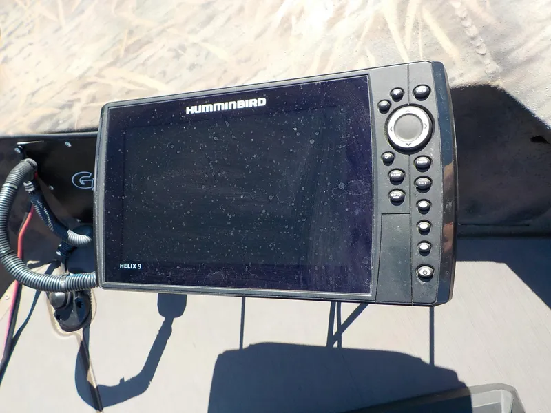 Slide: The Image of Humminbird Helix 9 fish finder on 2019 G3 Bay 20 DLX Camo boat. - 19