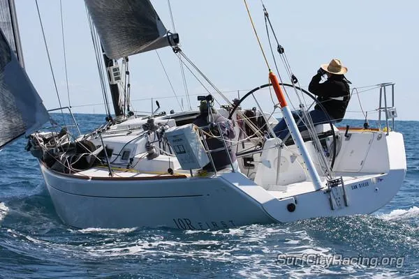 Slide: The Image of Sailing on a 2007 Beneteau First 10R yacht in open waters. - 11