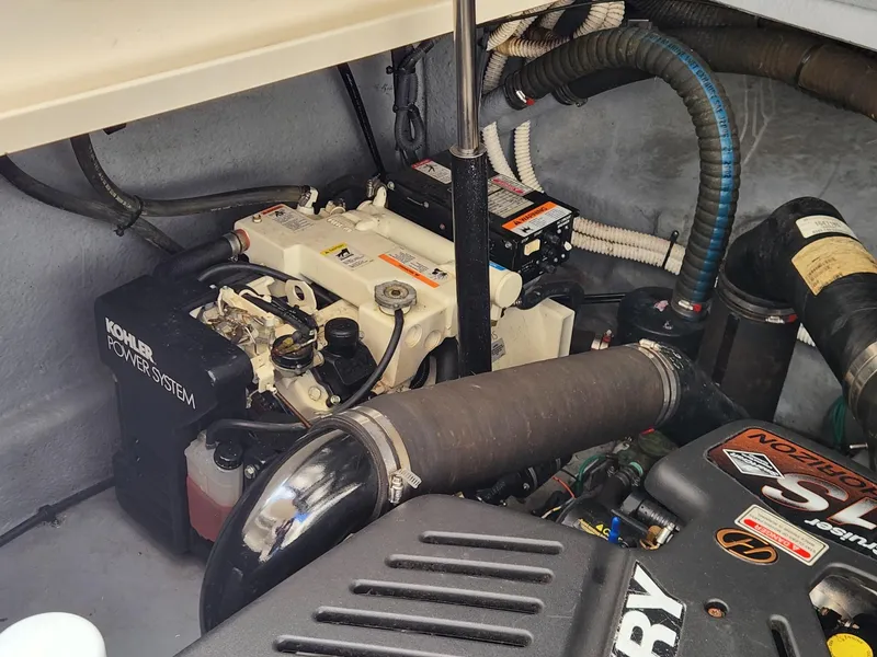 Slide: The Image of Engine compartment of a 2003 Sea Ray 340 Sundancer with Kohler power system. - 22