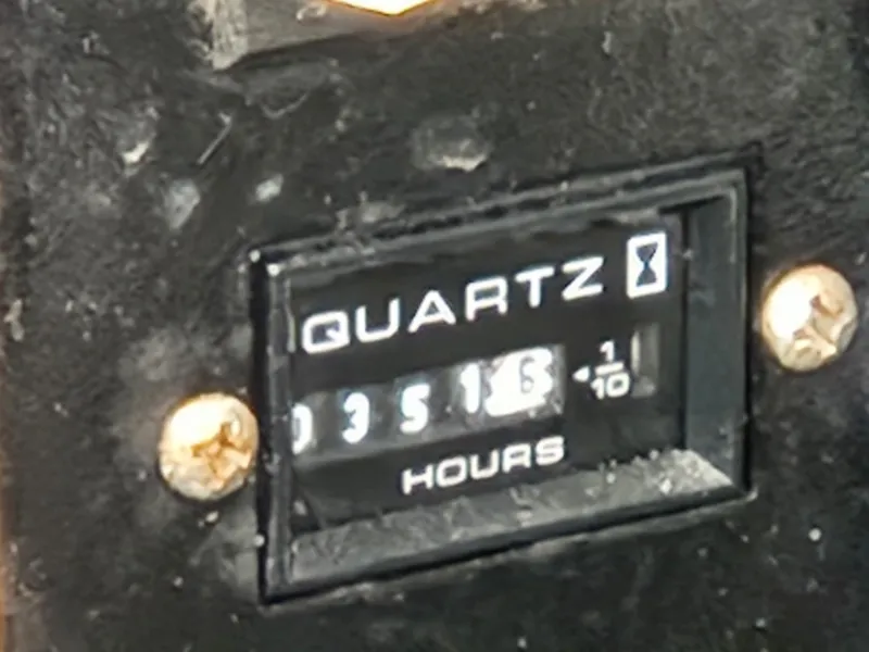 Slide: The Image of Hour meter showing 3516.6 hours on 2003 Sea Ray 340 Sundancer. - 23