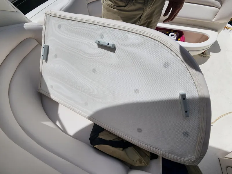 Slide: The Image of 2003 Sea Ray 340 Sundancer interior with seat cushion and storage compartment. - 5