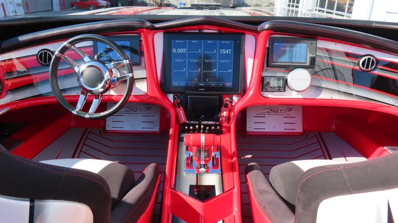 Slide: The Image of Red and black MTI 44 boat cockpit with advanced navigation system, 2014 model. - 13