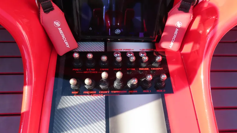 Slide: The Image of Control panel of a 2014 MTI 44 boat with Mercury branding. - 31