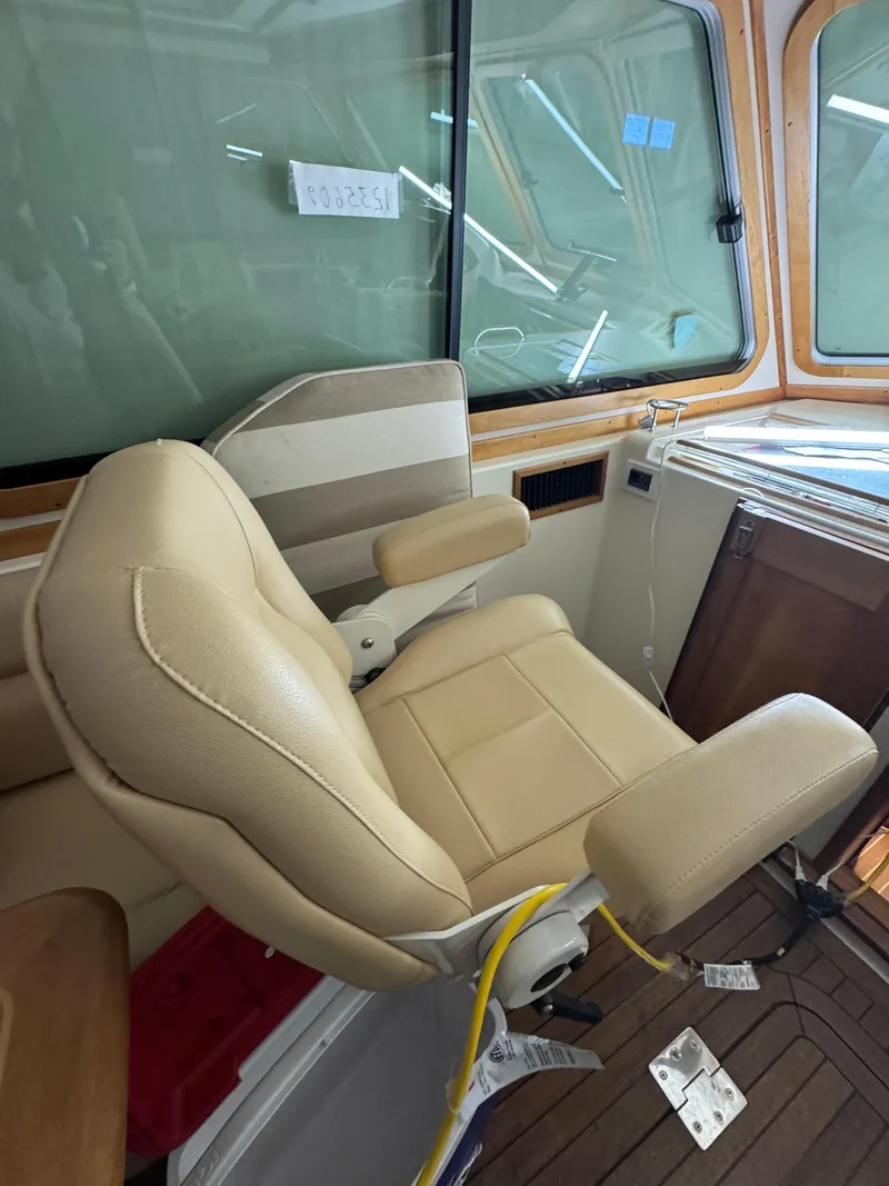 Slide: The Image of Captain's chair in 2008 Sabre 38 Hardtop Express boat interior. - 27