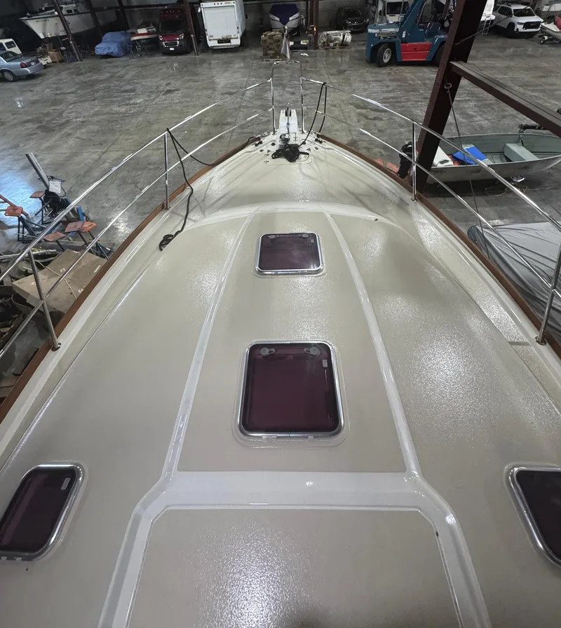 Slide: The Image of 2008 Sabre 38 Hardtop Express boat deck in storage facility. - 53