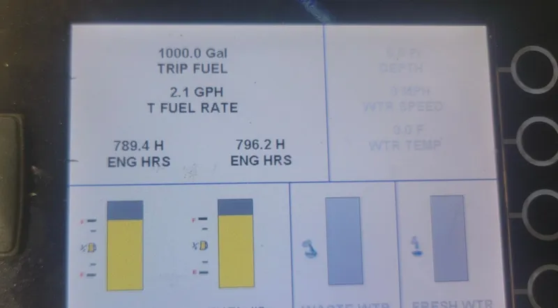 Slide: The Image of Display screen showing fuel and engine hours for 2008 Sabre 38 Hardtop Express. - 57