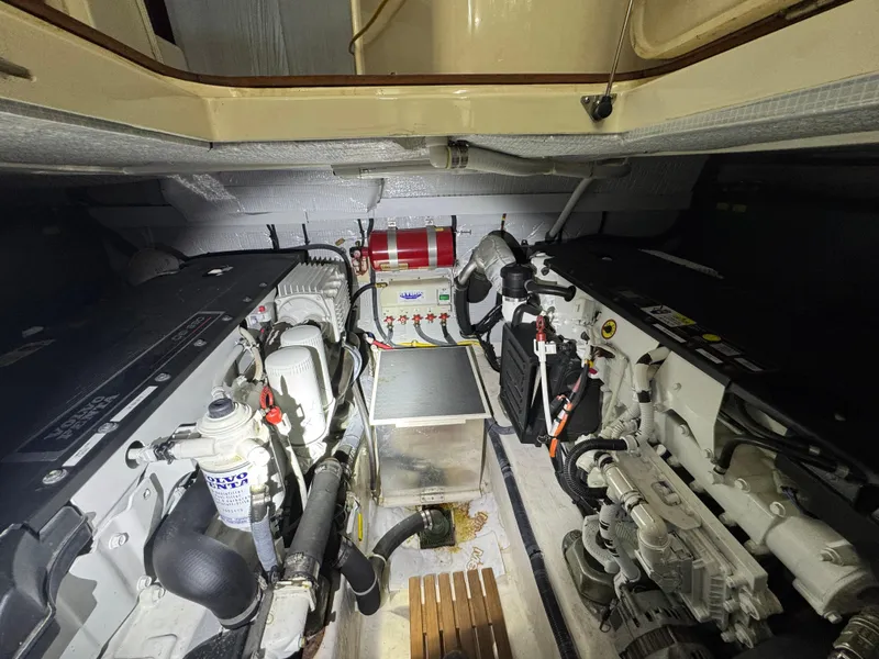 Slide: The Image of Engine room of 2008 Sabre 38 Hardtop Express, showcasing mechanical components and systems. - 61