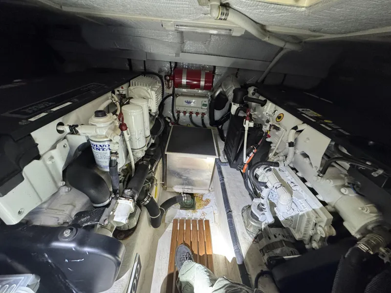 Slide: The Image of Engine room of 2008 Sabre 38 Hardtop Express, showcasing mechanical components and layout. - 62