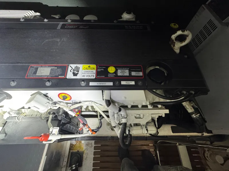 Slide: The Image of Engine compartment of a 2008 Sabre 38 Hardtop Express boat, showing detailed components and wiring. - 65