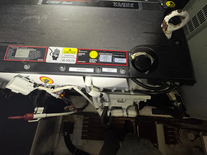 Slide: The Image of Engine compartment of a 2008 Sabre 38 Hardtop Express, showing detailed components and wiring. - 66