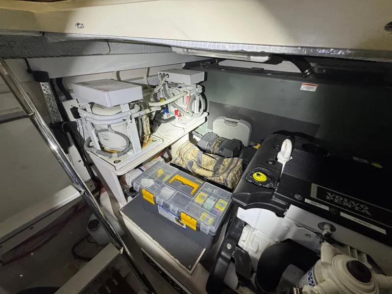 Slide: The Image of Engine room of 2008 Sabre 38 Hardtop Express with tools and equipment. - 67