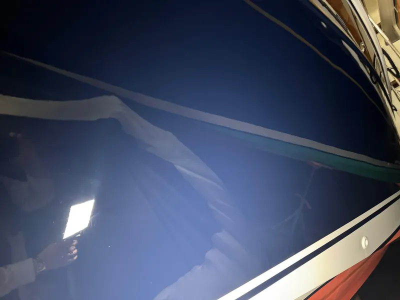 Slide: The Image of 2008 Sabre 38 Hardtop Express boat hull with glossy blue finish. - 81