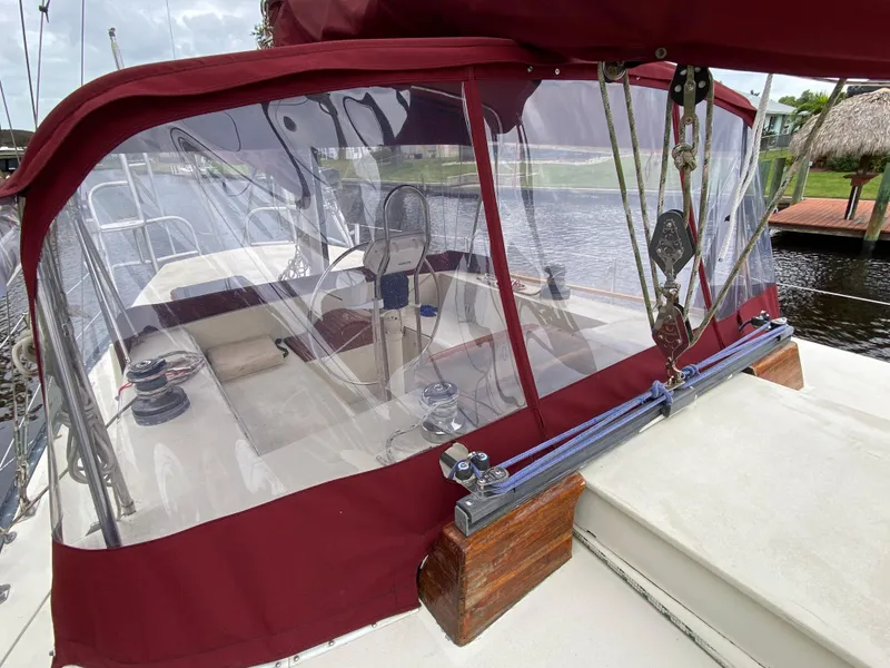 Slide: The Image of 1986 Bruce Roberts 43 Ketch sailboat deck view at marina. - 10