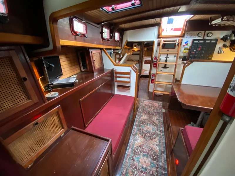 Slide: The Image of Cockpit of 1986 Bruce Roberts 43 Ketch with steering wheel and navigation instruments. - 27