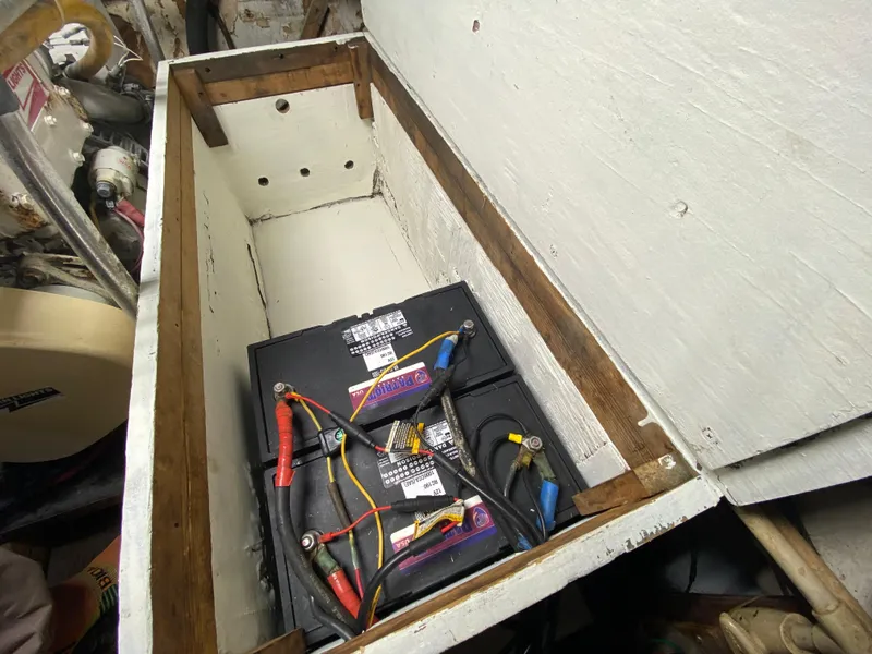 Slide: The Image of Interior of 1986 Bruce Roberts 43 Ketch sailboat with open storage compartment. - 47