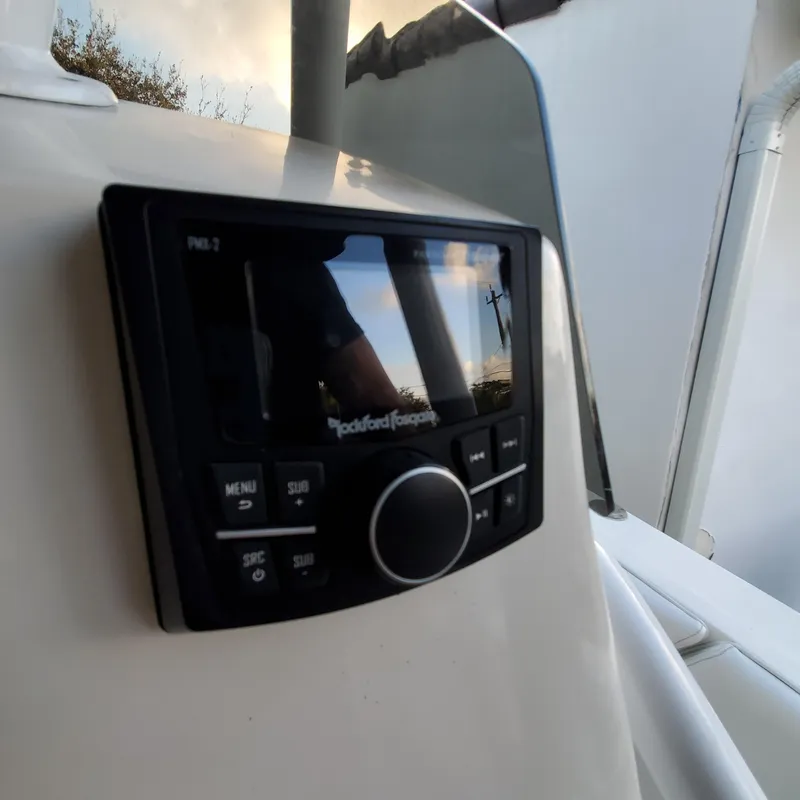 Slide: The Image of Close-up of a Rockford Fosgate audio system on a 1976 Formula 233 boat. - 7