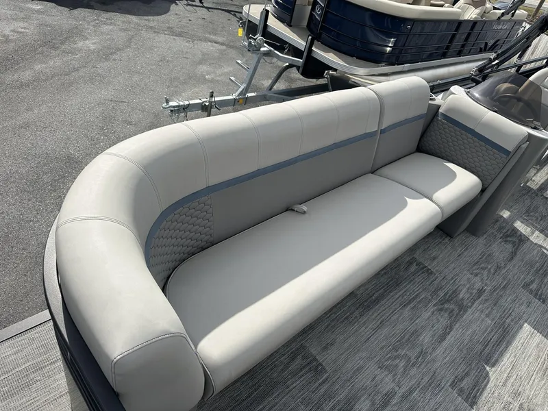 Slide: The Image of 2023 Qwest Pontoons XRE Cruise 22 interior seating, featuring elegant gray upholstery. - 5