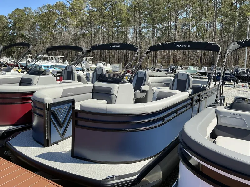 Slide: The Image of 2025 Viaggio Lago V 22U pontoon boat displayed outdoors. - 1