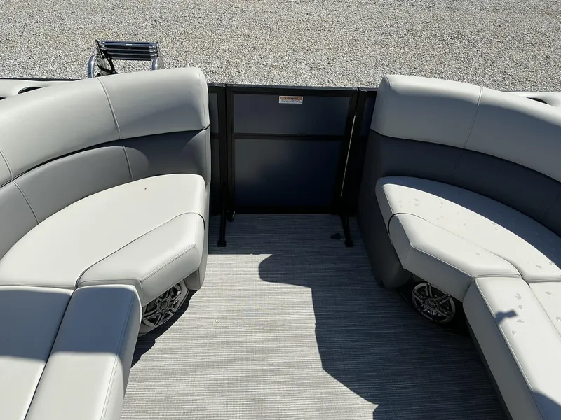 Slide: The Image of 2025 Viaggio Lago V 22U boat interior with gray seating and carpeted floor. - 11