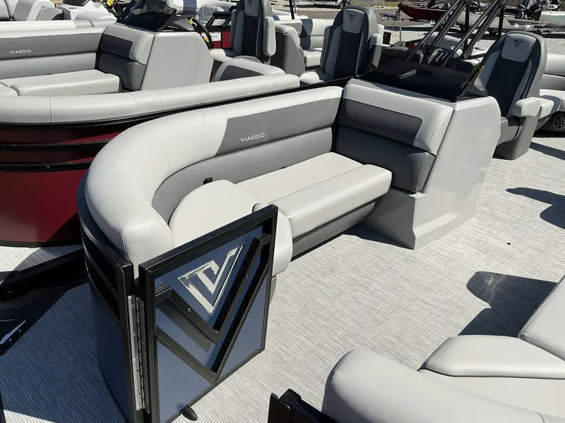 Slide: The Image of 2025 Viaggio Lago V 22U pontoon boat interior with modern seating and sleek design. - 4