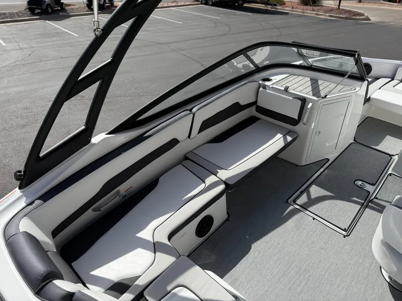 Slide: The Image of 2025 Yamaha Boats AR195 interior with sleek seating and modern design. - 22