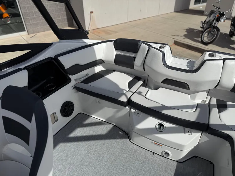 Slide: The Image of 2025 Yamaha Boats AR195 interior with sleek seating and modern design. - 24