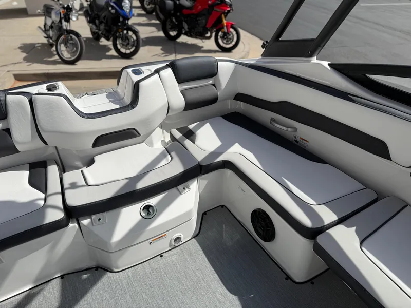 Slide: The Image of 2025 Yamaha Boats AR195 interior with sleek seating and modern design. - 25