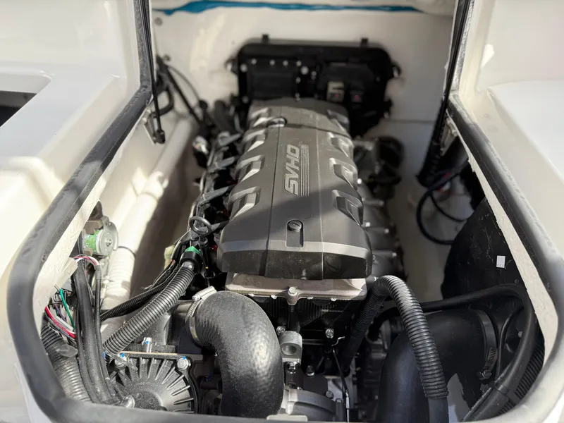 Slide: The Image of 2025 Yamaha Boats AR195 engine compartment, showcasing powerful motor and components. - 29