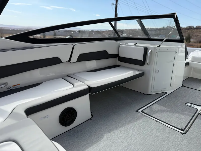 Slide: The Image of 2025 Yamaha Boats AR195 interior with sleek seating and modern design. - 31