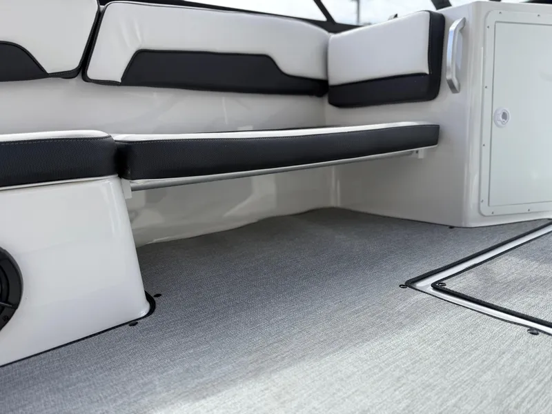 Slide: The Image of Interior view of 2025 Yamaha Boats AR195, featuring sleek seating and modern design. - 32