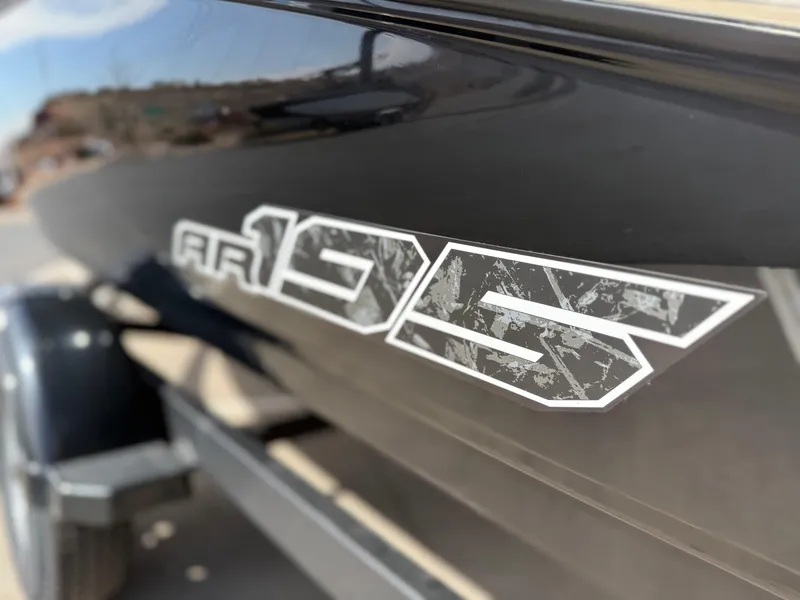 Slide: The Image of 2025 Yamaha Boats AR195 logo on sleek black hull. - 4