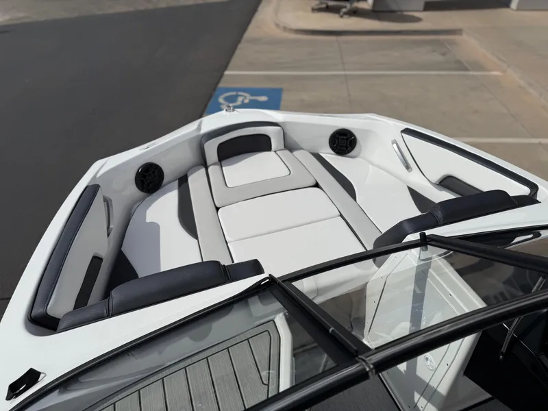 Slide: The Image of 2025 Yamaha Boats AR195 interior with sleek seating and modern design. - 47