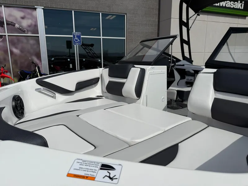 Slide: The Image of 2025 Yamaha Boats AR195 interior with sleek seating and modern design. - 49