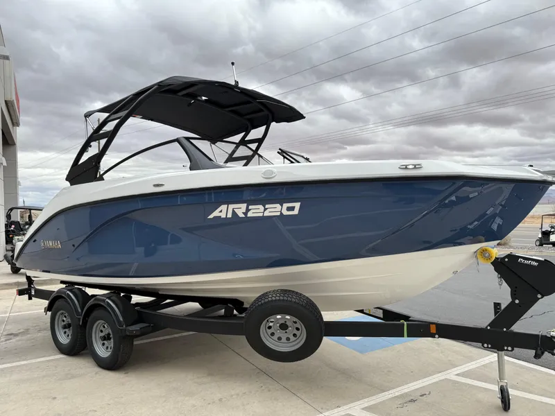 Slide: The Image of 2025 Yamaha Boats AR220 on trailer, featuring sleek design and modern aesthetics. - 18