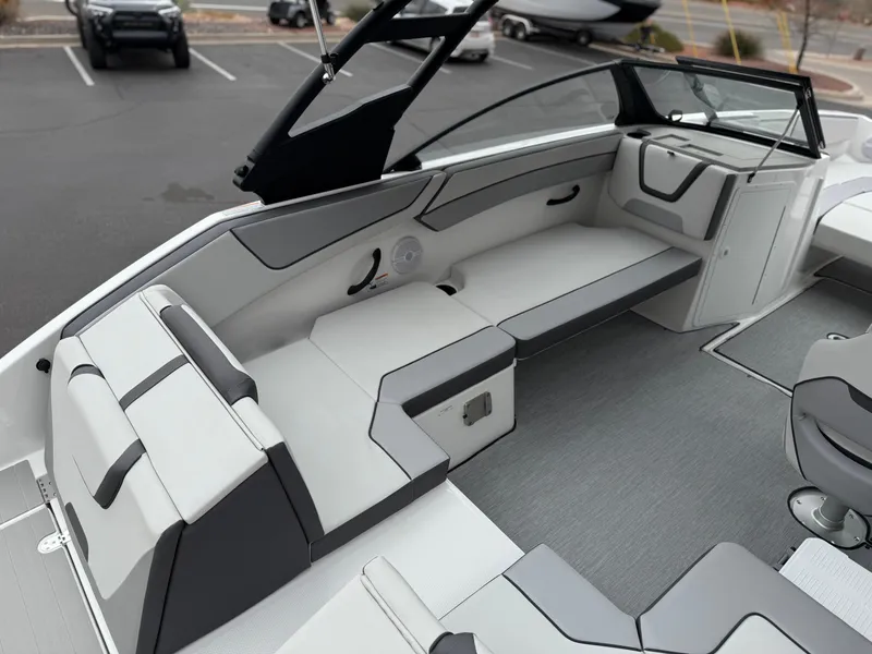 Slide: The Image of 2025 Yamaha Boats AR220 interior with sleek seating and modern design. - 28