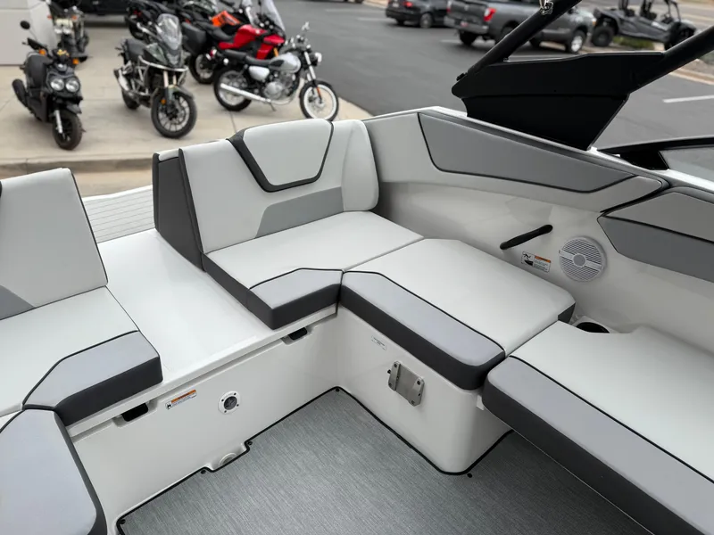 Slide: The Image of 2025 Yamaha Boats AR220 interior seating with modern design and comfortable upholstery. - 32