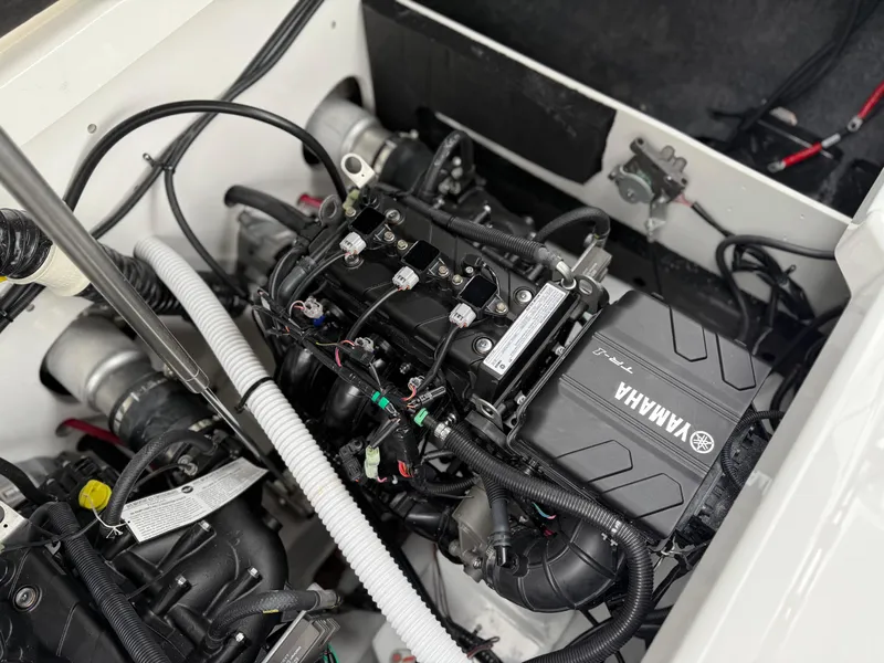 Slide: The Image of 2025 Yamaha Boats AR220 engine compartment, showcasing advanced marine engineering. - 37