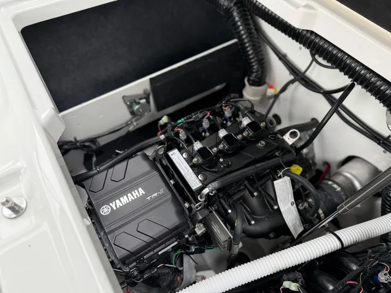 Slide: The Image of 2025 Yamaha Boats AR220 engine compartment, showcasing advanced marine engineering. - 38