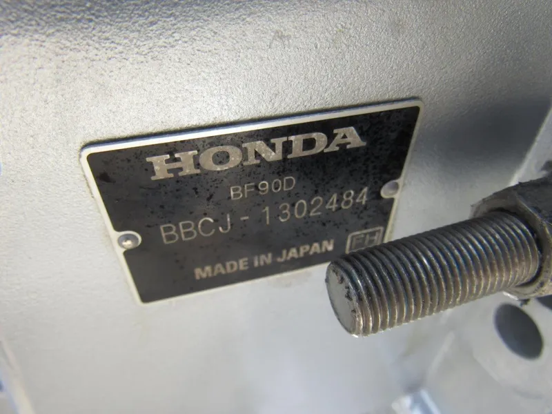 Slide: The Image of Close-up of Honda BF90D engine plate on 2015 Hewescraft 180 Sportsman. - 18