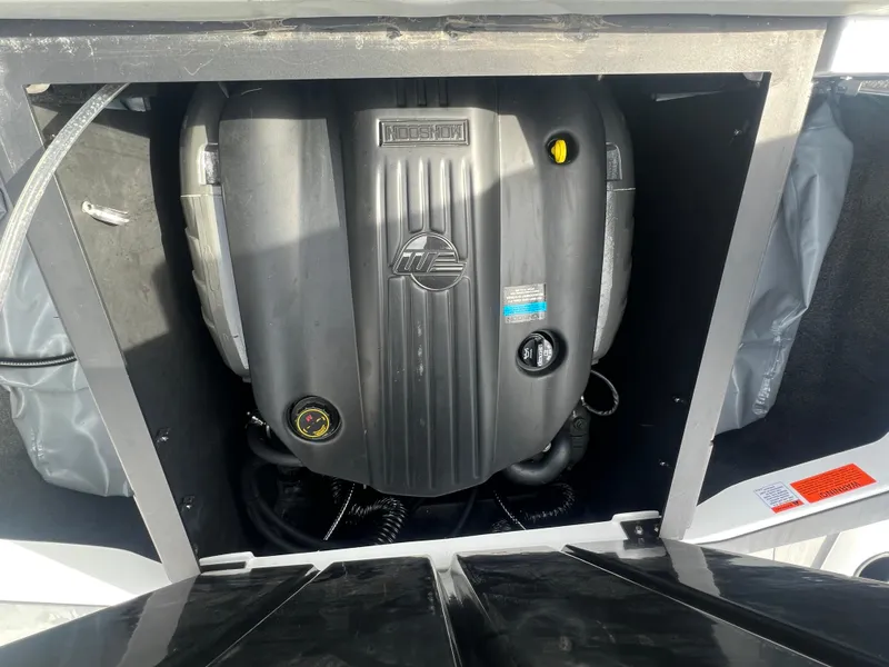 Slide: The Image of 2023 Axis Wake Research T220 engine compartment, showcasing powerful inboard motor. - 18