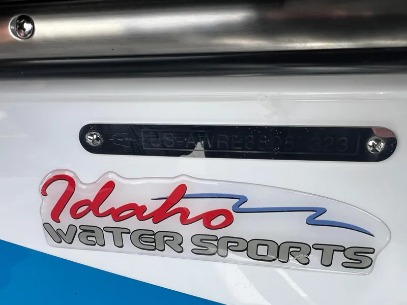 Slide: The Image of 2023 Axis Wake Research T220 boat with Idaho Water Sports logo. - 19