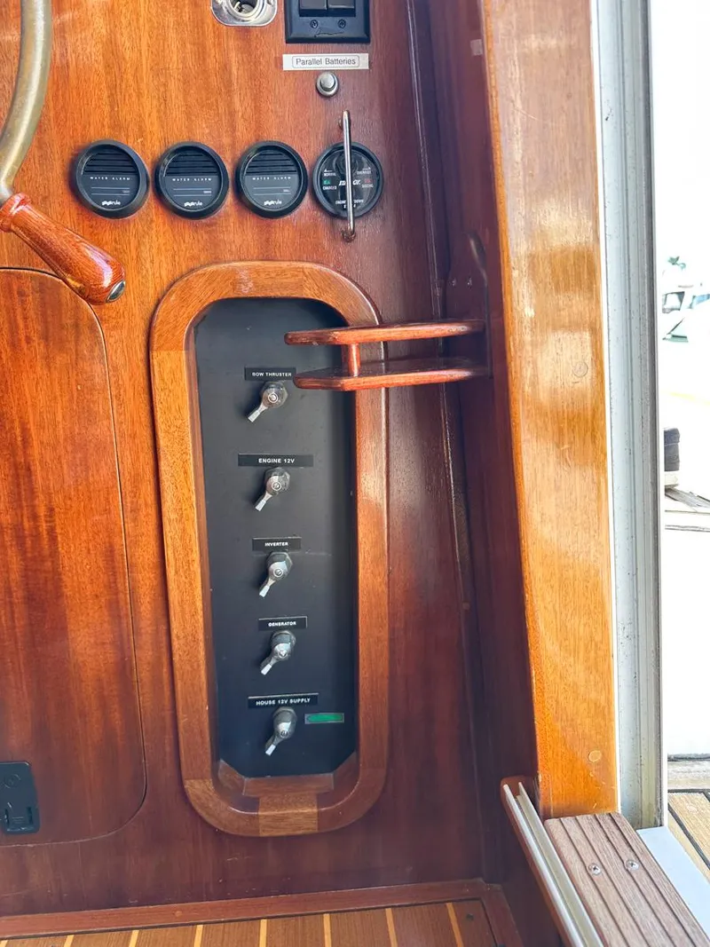 Slide: The Image of Bathroom interior of 2000 Legacy Yachts 40 Sedan with wooden accents and modern amenities. - 43