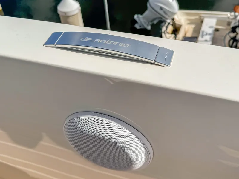 Slide: The Image of 2024 De Antonio Yachts D28 Open, featuring sleek design and integrated speaker system. - 17
