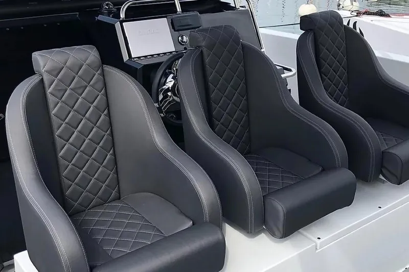 Slide: The Image of Luxurious seating on 2024 De Antonio Yachts D28 Xplorer with quilted upholstery. - 11