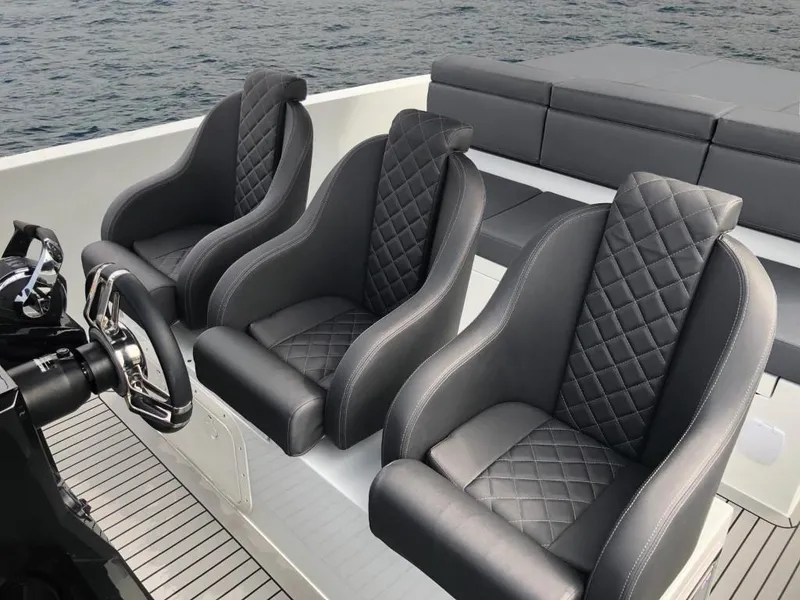 Slide: The Image of Luxury seating on 2024 De Antonio Yachts D28 Xplorer, featuring quilted leather design. - 16