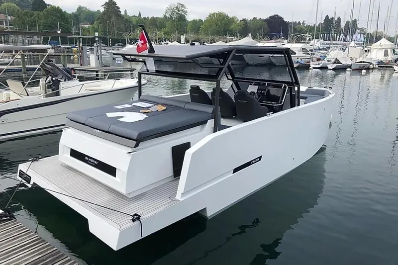 Slide: The Image of 2024 De Antonio Yachts D28 Xplorer docked, showcasing sleek design and modern features. - 5