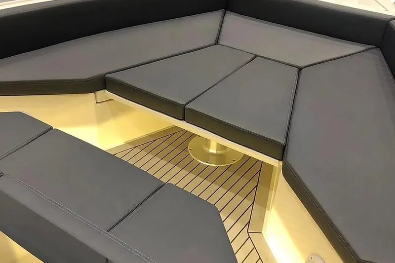 Slide: The Image of 2024 De Antonio Yachts D28 Xplorer interior seating with sleek, modern design. - 7