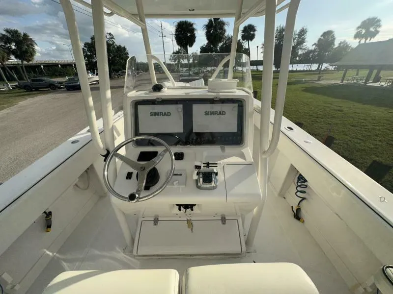 Slide: The Image of 2008 Jupiter 31 FS Center Console boat interior with dual Simrad displays. - 3